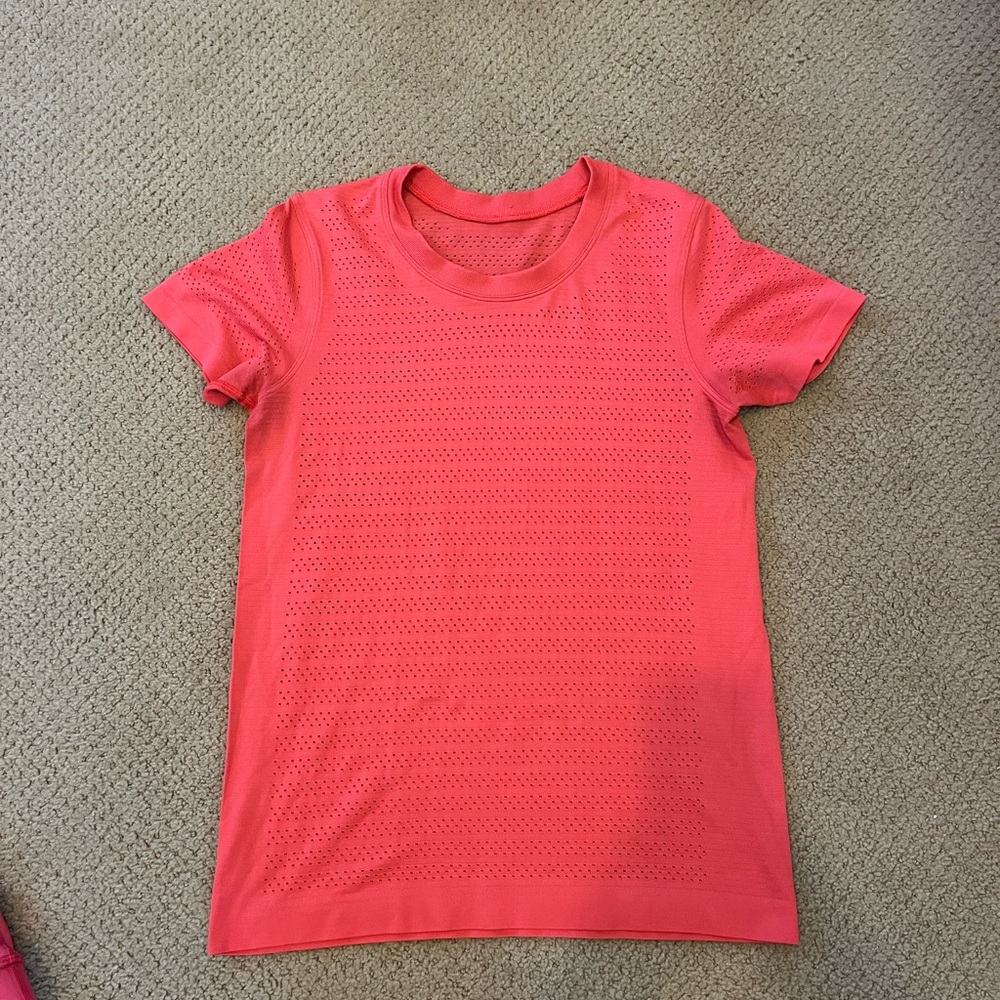Lululemon perforated running shirt in coral
